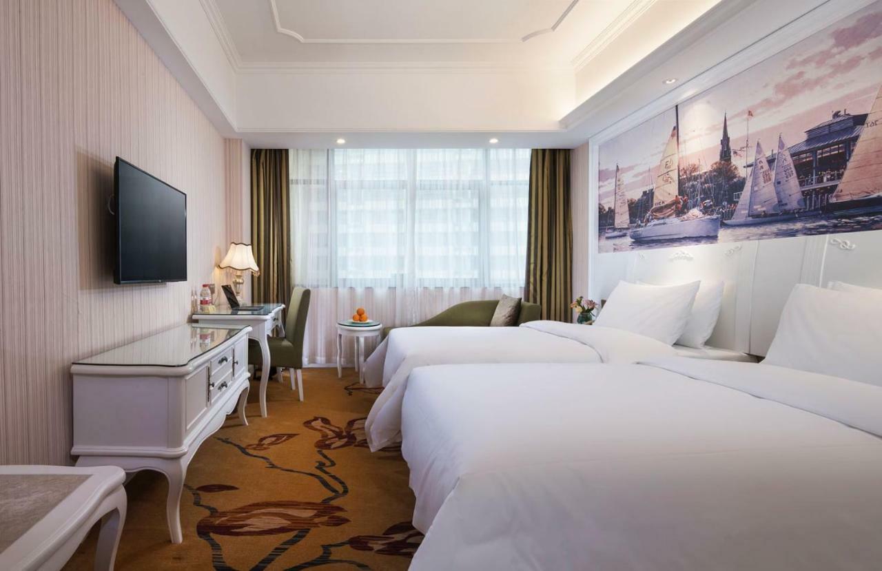 Vienna International Hotel Fenghua Zhongshan Road Exteriör bild